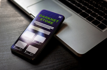 Darknet store market for buying and selling illegal goods concept. Smartphone with anonymous black...