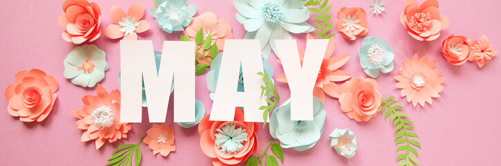 The lettering may, made of paper flowers. Hello, may. Concept of flowering, spring