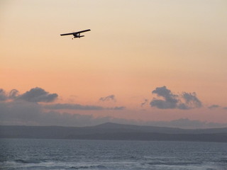 airplane in the sunset