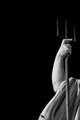 Neptune God of the Sea Trident and Naval Power concept. Marble statue erected in 1823 in People's Square in Rome (Black and White with copy space) © crisfotolux