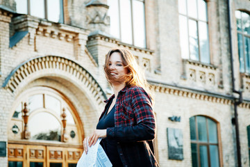 student girl near the university building