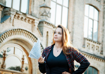 student girl near the university building