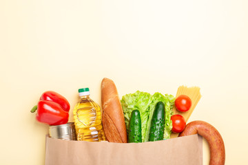 Paper bag of food, fruit, vegetable. Delivery service during quarantine, coronavirus covid-19. Top view. Copy space