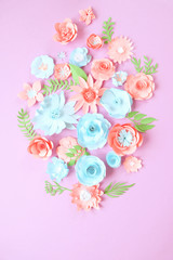 Flower background of multi-colored paper flowers. Handmade