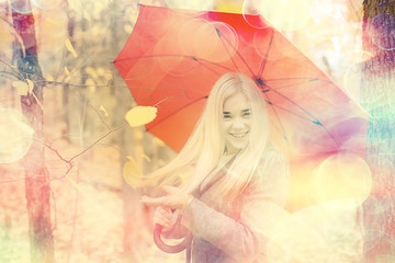 autumn look, sunny day a young girl with an umbrella walks in a yellow park in October