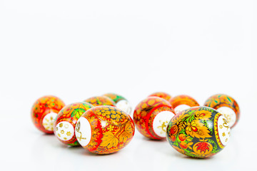 Easter bright colored eggs isolated on a white background. The minimum concept of Easter. Happy Easter card. Copy space 