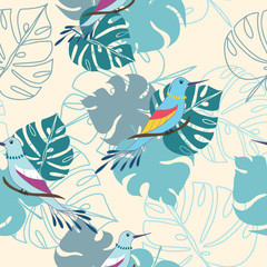 Fototapeta na wymiar Seamless pattern with tropical leaves and birds