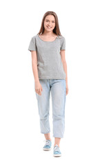 Obraz premium Young woman in stylish t-shirt on white background