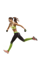 Running athlete on a white background, jump to the finish line, flying girl