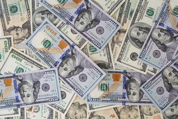 Background with money of american hundred dollar and other notes.