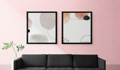 Frames on pink wall psd