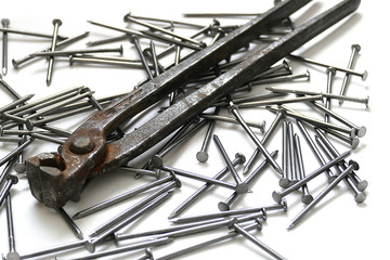 nails and nippers on a white background,