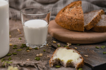 Meal with milk and bread in the country on World Milk Day. Horizontal shot.