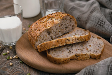 Rustic breakfast with milk and bread. World Milk Day on the first of June. Horizontal shot from above.