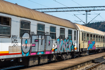 old train painted with graffiti