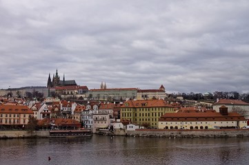 Panoramic view of Mala Strana  quarter with the castle, from the Charles Bridge on the Vltava river (Prague, Czech Republic, Europe)