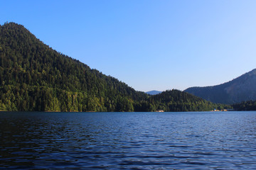 Forest lake calm in the Caucasus mountains
