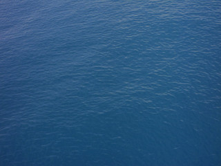 Calm blue water surface of the sea. Sea background