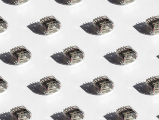 Seamless pattern of nixie tubes IN-12 on a white background, hard light
