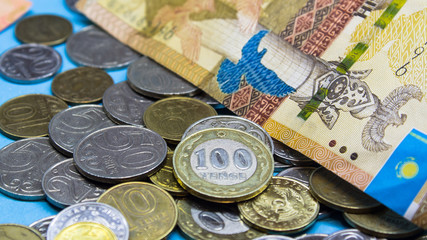 Kazakhstan tenge money with tenge coins. Economy of Kazakhstan.Tenge in Kazakhstan. Tenge KZT, Bank of Kazakhstan.