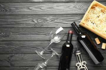Composition with tasty wine on wooden background