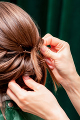 Obraz premium Hairdresser making hairstyle.