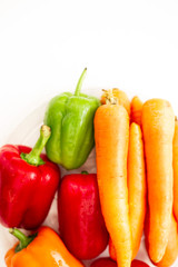 red and yellow peppers on white