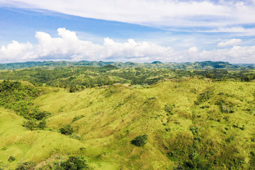 Fototapeta na wymiar Green hills, aerial view. The nature of the Philippine Islands, Samar.