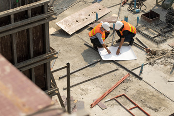 Engineers and workers on the construction site