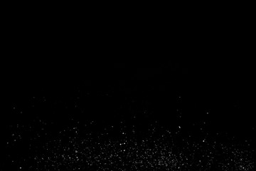 Isolated Dust Dirt Particles Salt Snow Powder Spray. Authentic Black Rough Grunge Distressed Overlay Texture Surface. 