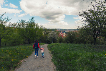 Obraz premium Mother and daughter walk in the Park in the fresh air. They are happy together.