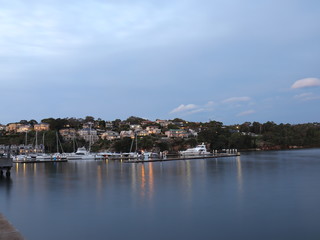 Fototapeta na wymiar Drone Panoramic Aerial view of Sydney Harbour and the beautiful vibrant colours of the afternoon showing smooth harbour waters 