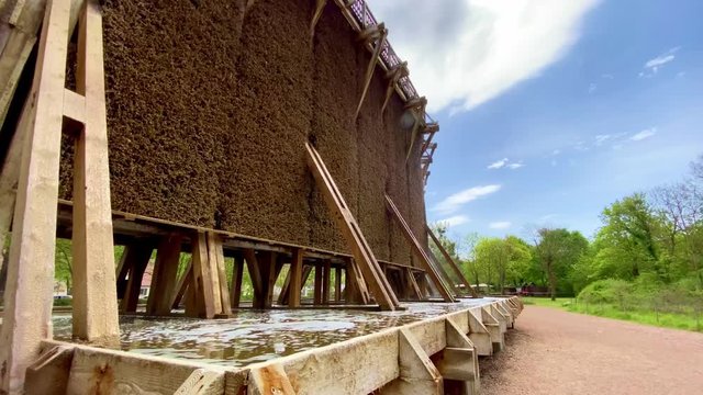 Wooden graduation tower or thorn house called "Gradierwerk" to remove water from a saline solution by evaporation. Bad Kreuznach, Germany.