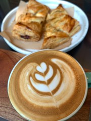 Cappuccino and pie, Latte art by milk on top with leaf and pie