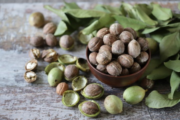 Walnuts in a bowl. Green walnuts. Harvest walnuts.