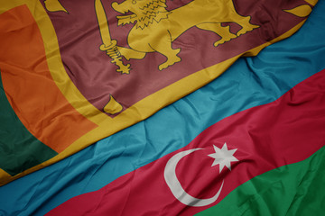 waving colorful flag of azerbaijan and national flag of sri lanka.