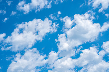 Obraz na płótnie Canvas Blue sky background with white clouds, texture