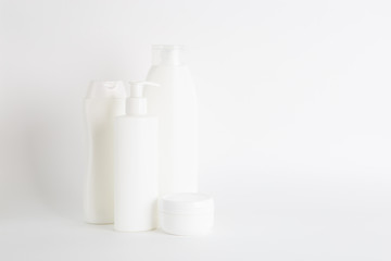 Clean white cosmetics bottles on a white background. Isolate.
