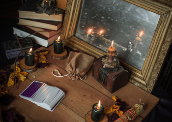 Tarot cards and esoteric concept. Magic rituals. Mystical table with details, 