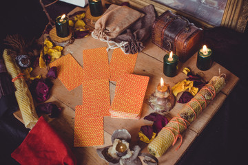 Tarot cards and esoteric concept. Magic rituals. Mystical table with details, 