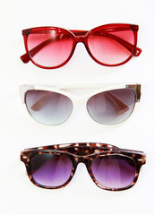 sunglasses with colored lenses and plastic frames