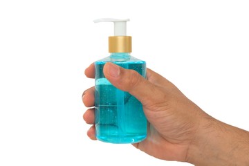 The hand is holding alcohol pump bottle on a white background. With Clipping Path.