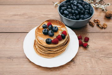 Pankeys with berries on the plate