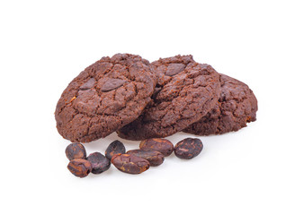 Chocolate cookie with cocoa seeds on white background