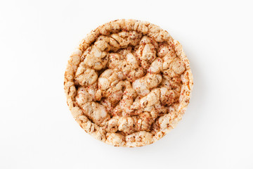 Crispy rice bread on a white background. Top view, flat lay