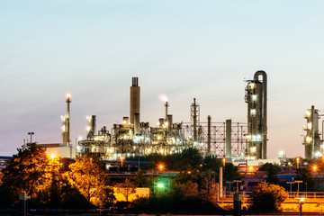 Illuminated industrial plants of a chemical plant at night
