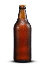 600ml brown beer beer bottle with drops isolated on a white background