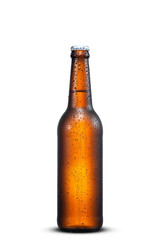 500ml brown beer beer bottle with drops isolated on a white background