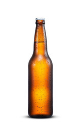 600ml brown beer beer bottle with drops isolated on a white background