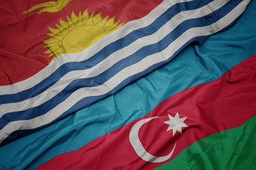 waving colorful flag of azerbaijan and national flag of Kiribati .